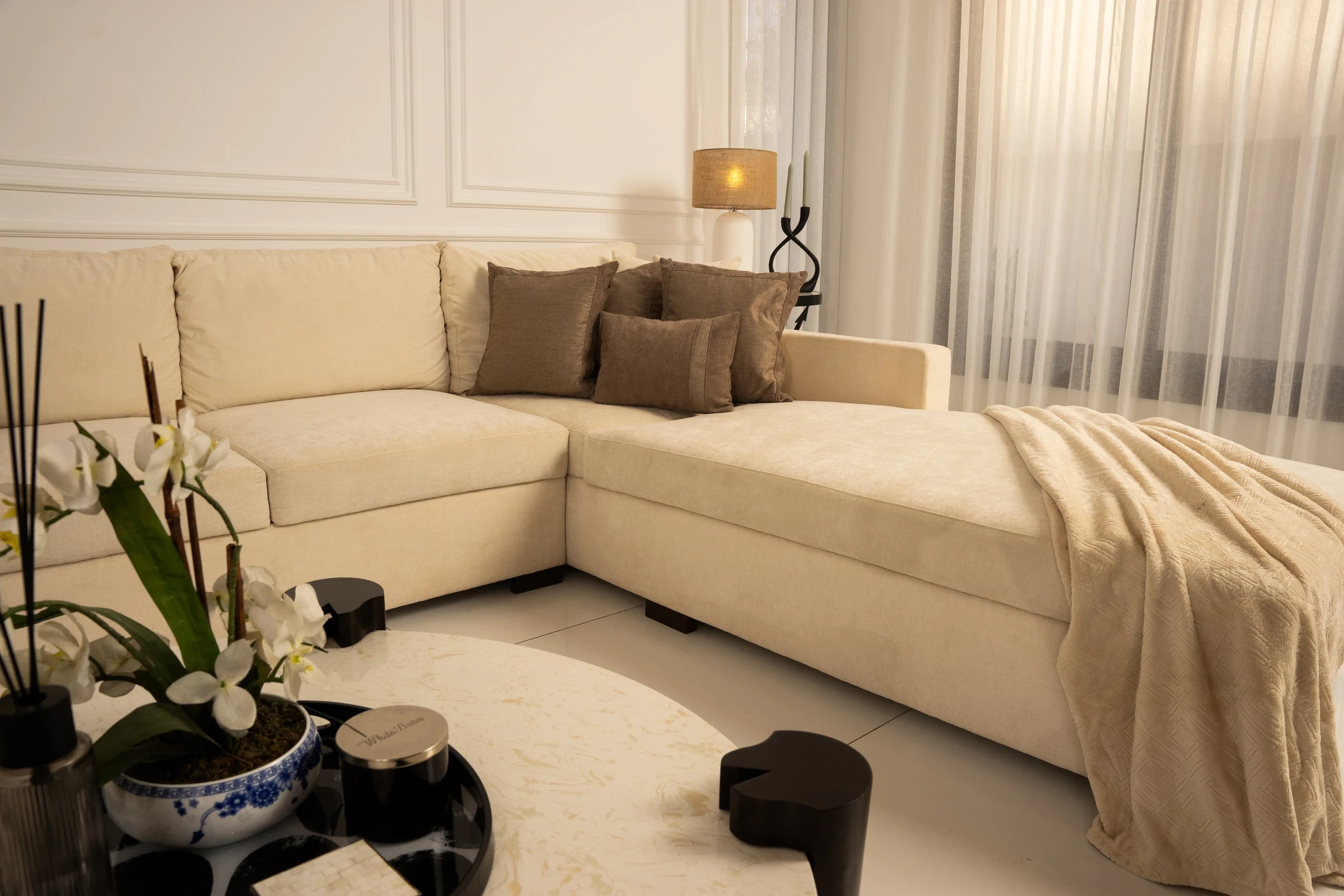 Close composition of sectional upholstery and chaise.