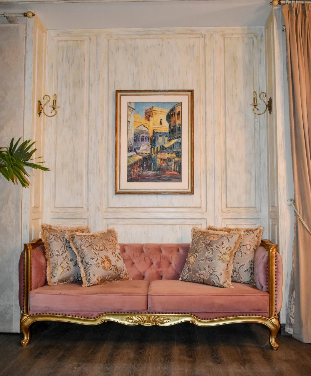 Product-focused sofa with carved frame.