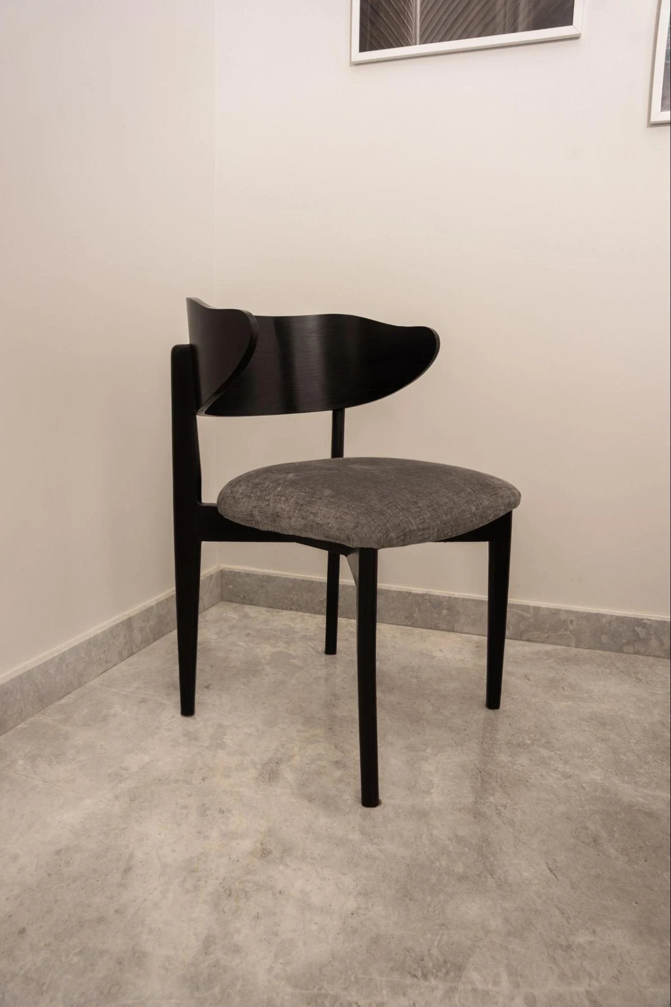 Individual upholstered chair.
