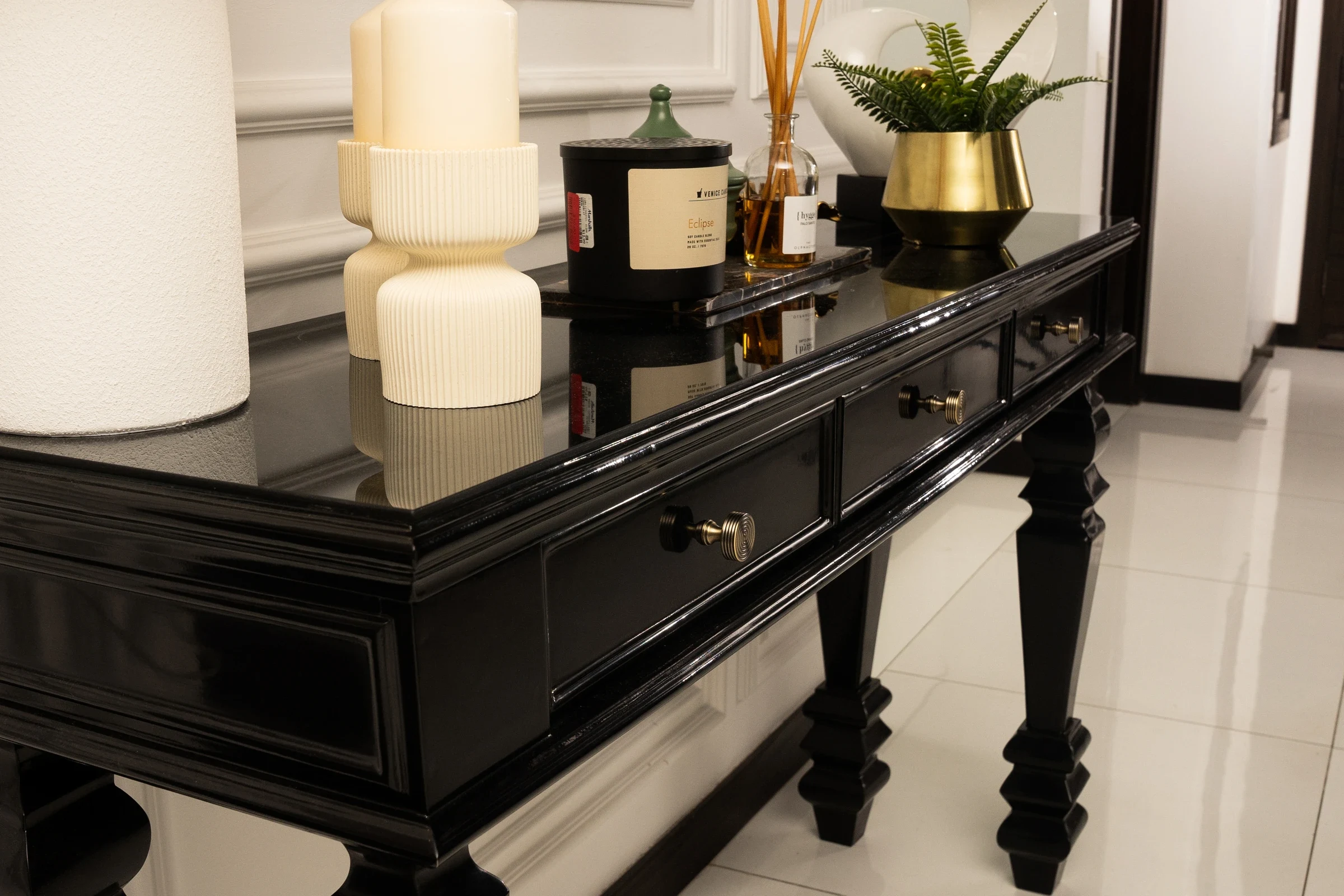 Long turned-leg console with decorative styling.