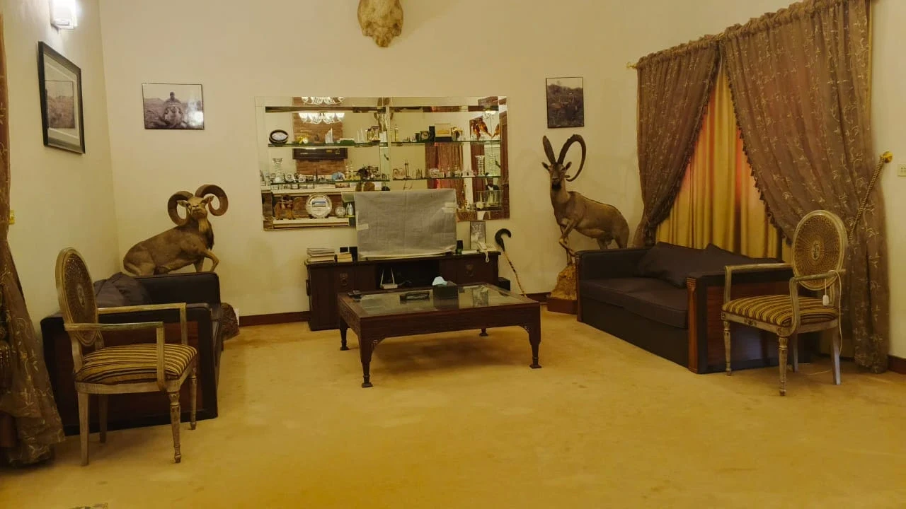 Before photograph of the sitting room.